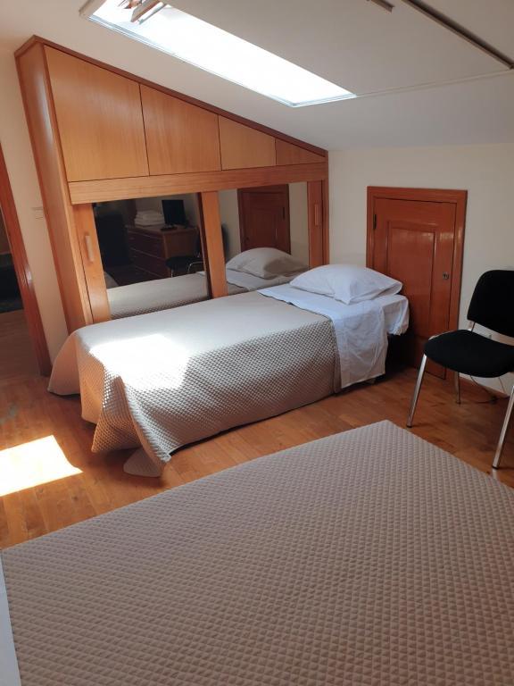 Postel nebo postele na pokoji v ubytování hostel do Ermal