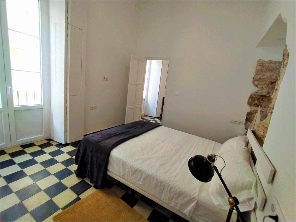 Posteľ alebo postele v izbe v ubytovaní Sol de Cádiz