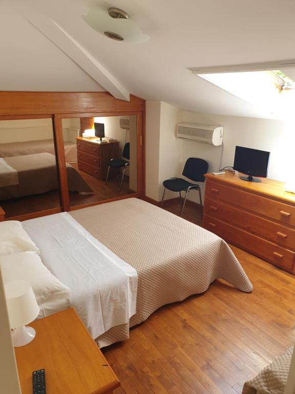Postel nebo postele na pokoji v ubytování hostel do Ermal