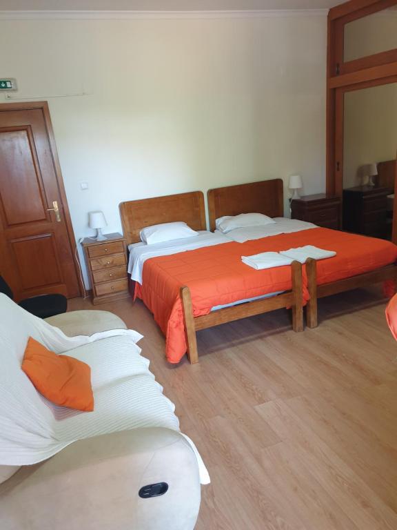 Postel nebo postele na pokoji v ubytování hostel do Ermal