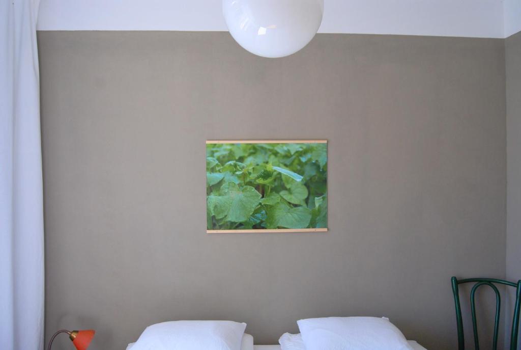 Postel nebo postele na pokoji v ubytování HEMMET Simrishamns vandrarhem och B&B