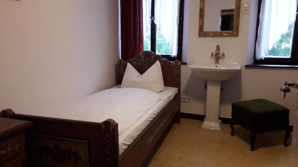 Postel nebo postele na pokoji v ubytování Hotel Feiler