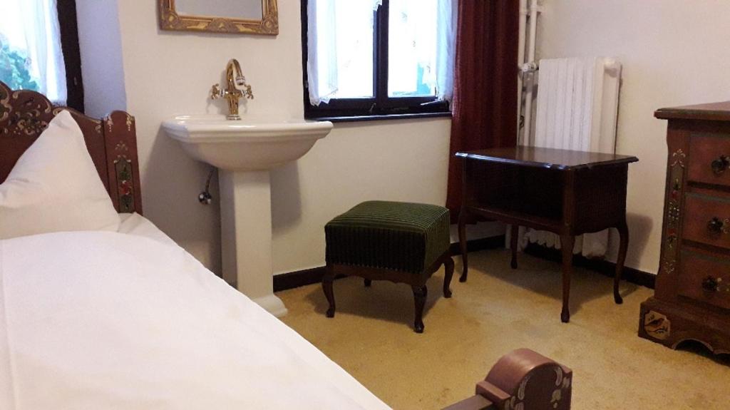 Postel nebo postele na pokoji v ubytování Hotel Feiler