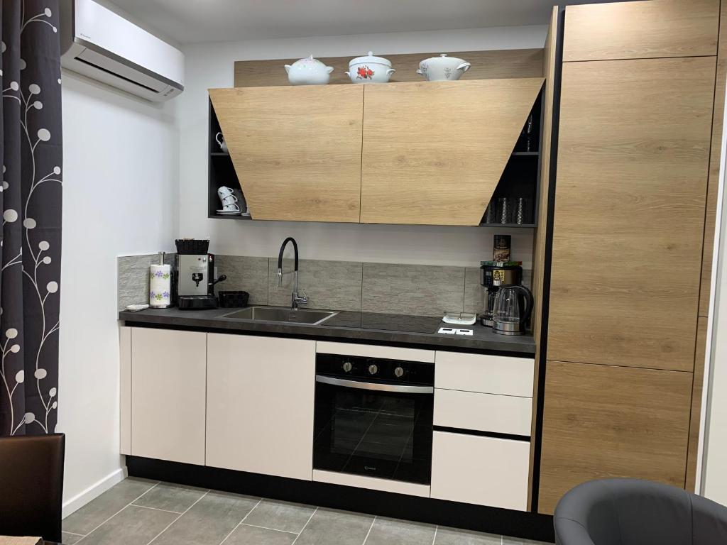 Kuchnia lub aneks kuchenny w obiekcie CEJM Apartments Merano