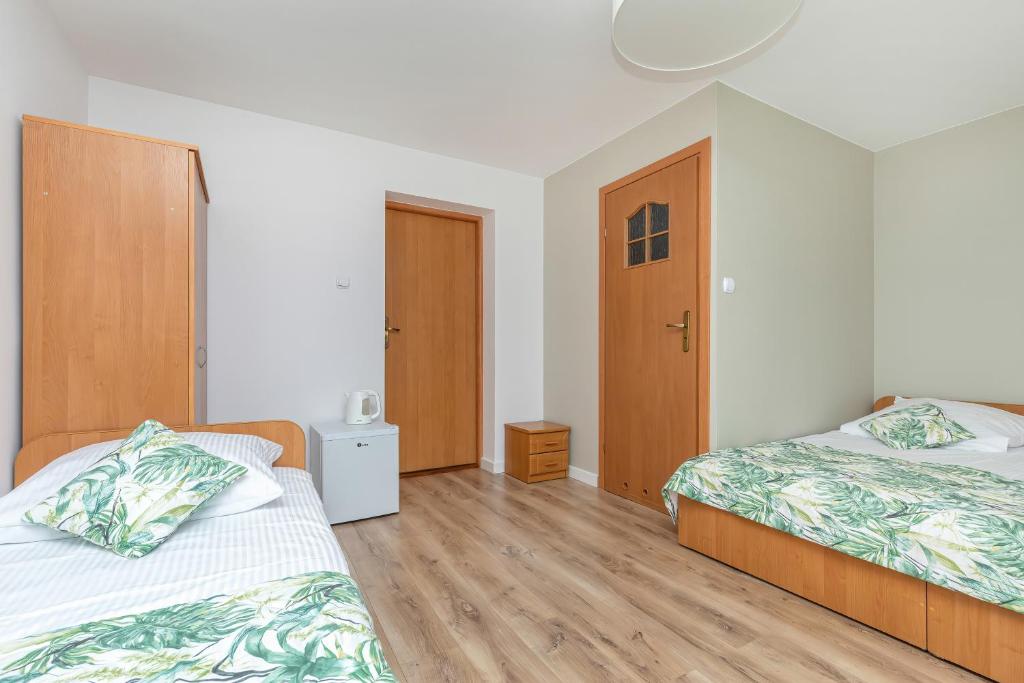 Postel nebo postele na pokoji v ubytování Paula