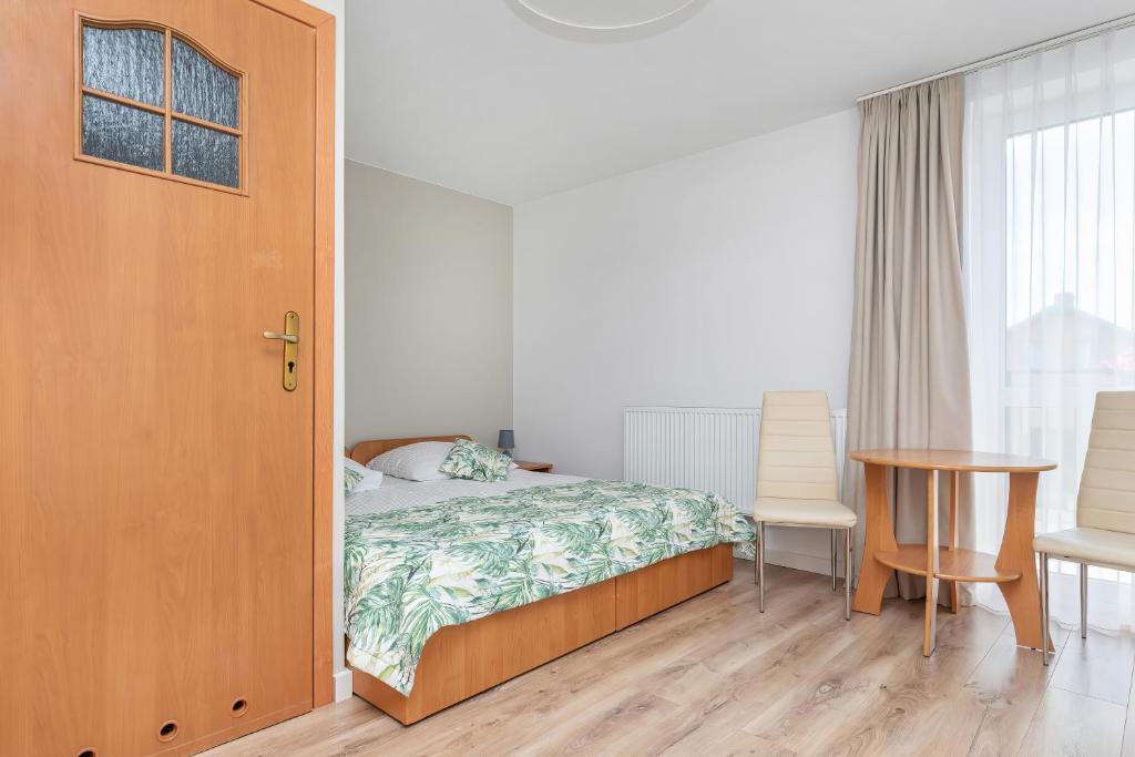 Postel nebo postele na pokoji v ubytování Paula