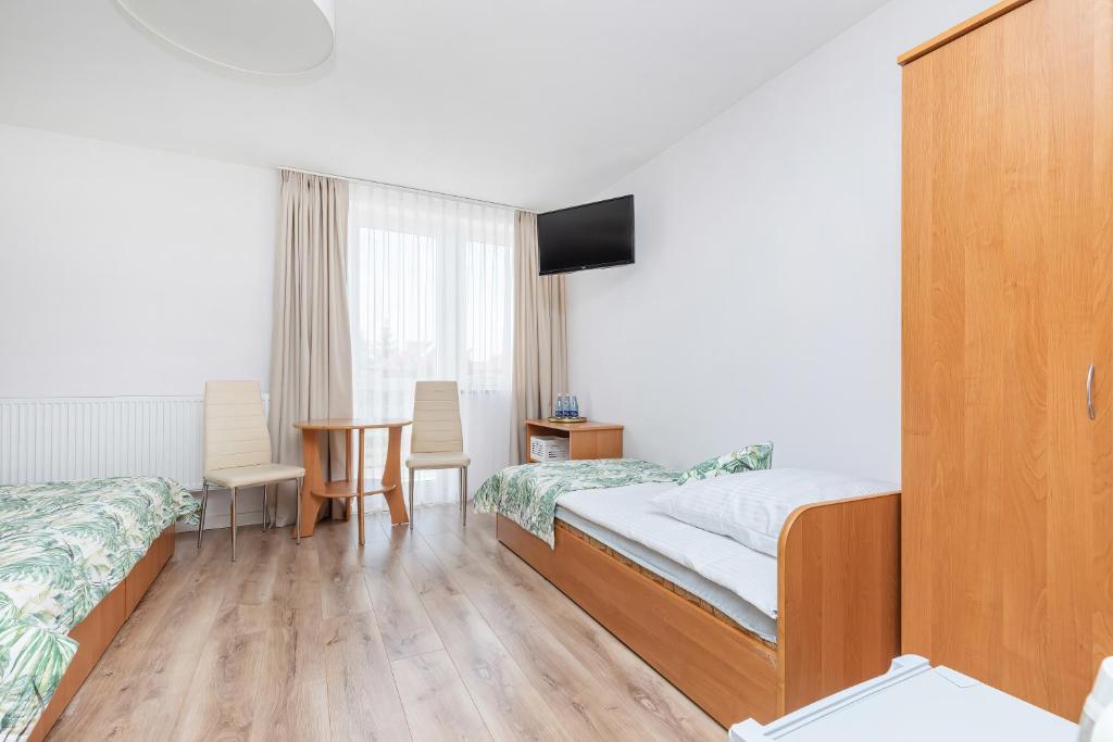 Postel nebo postele na pokoji v ubytování Paula