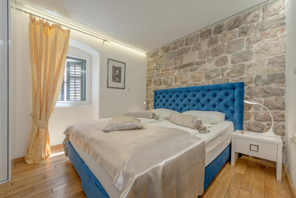 Postel nebo postele na pokoji v ubytování Guesthouse Imperator