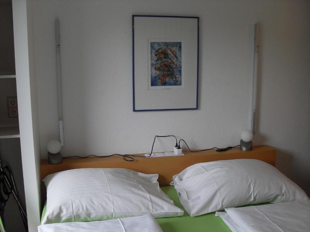 Postel nebo postele na pokoji v ubytování Haus Edith Privathaus mit Gästezimmern