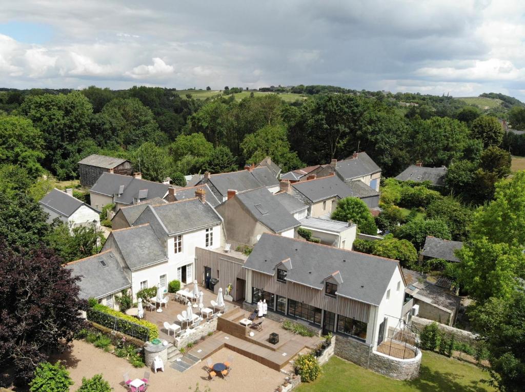 an aerial view of a large house at L'Audacieuse in Behuard