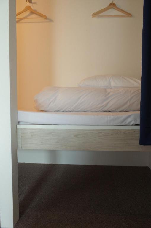 Postel nebo postele na pokoji v ubytování bnb+Atami Resort