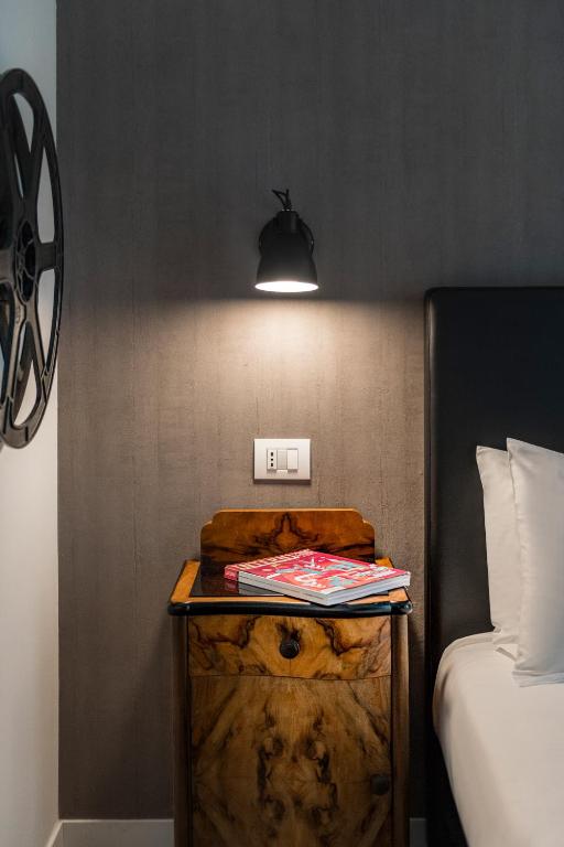 Postel nebo postele na pokoji v ubytování Up Hotel