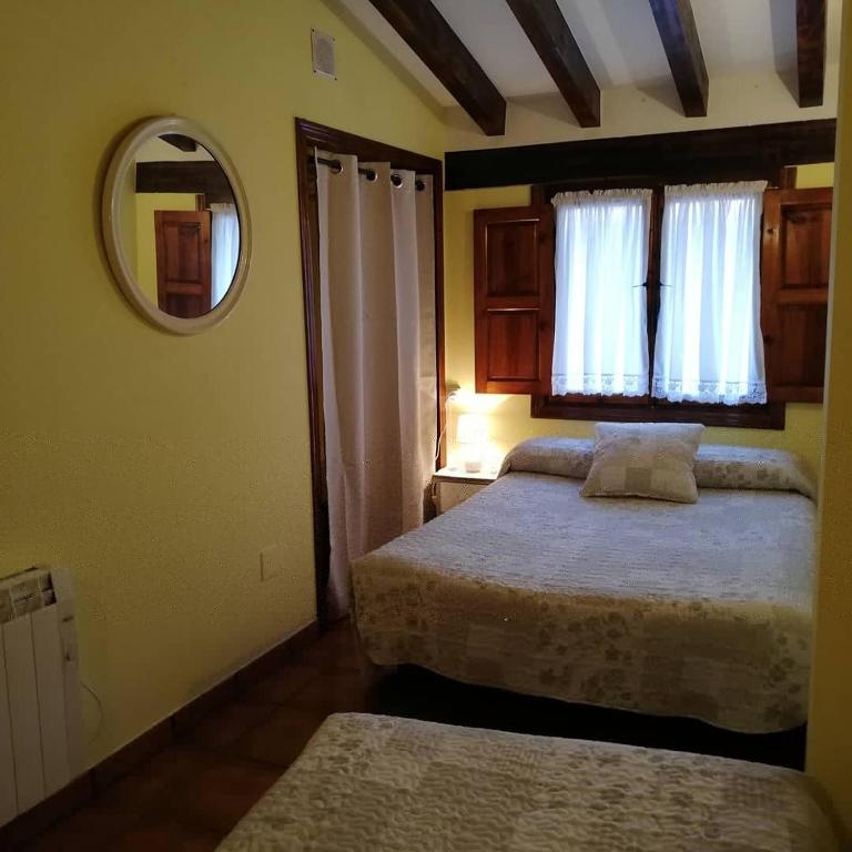 Postel nebo postele na pokoji v ubytování LA CASUCA Y LA CABAÑA