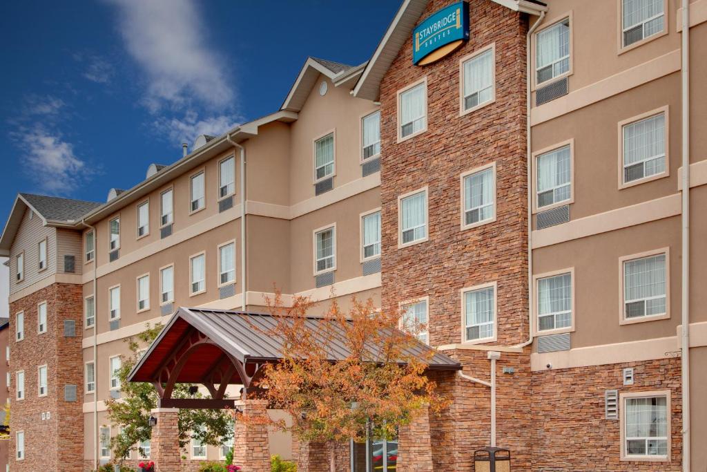 a rendering of a hotel with a building at Staybridge Suites - Calgary Airport, an IHG Hotel in Calgary