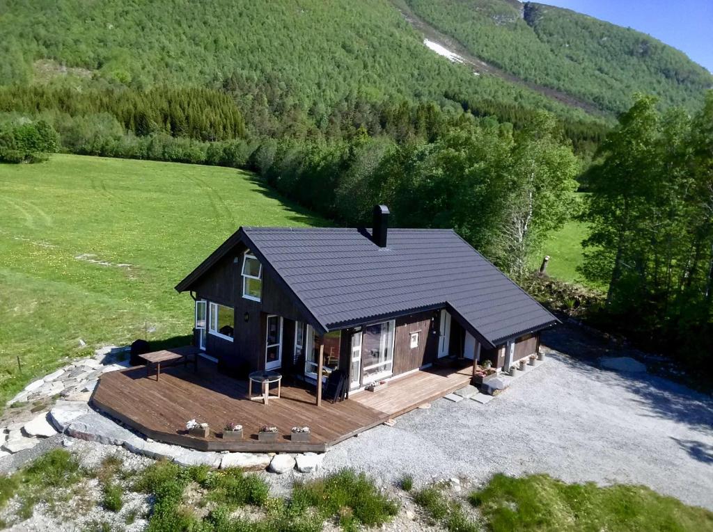 an aerial view of a house with a deck at Heinåli Hytta in Isfjorden