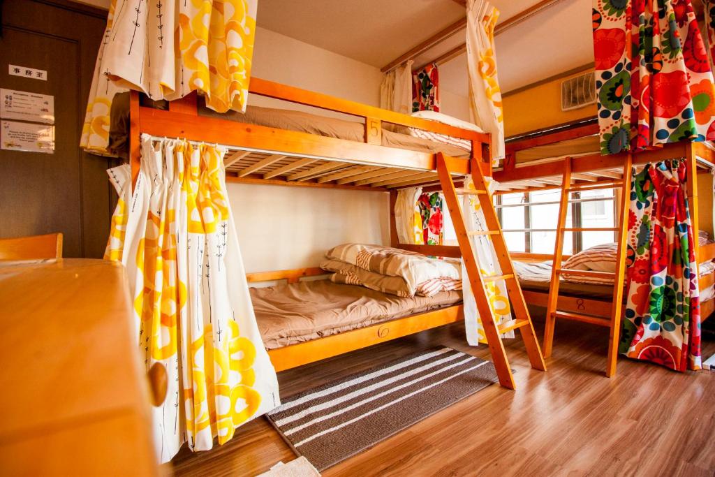 Postel nebo postele na pokoji v ubytování DEER Hostel OSAKA NAMBA