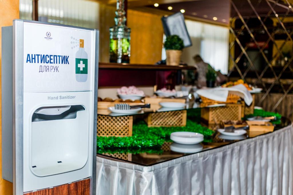 Kuchyň nebo kuchyňský kout v ubytování Zhemchuzhina Grand Hotel