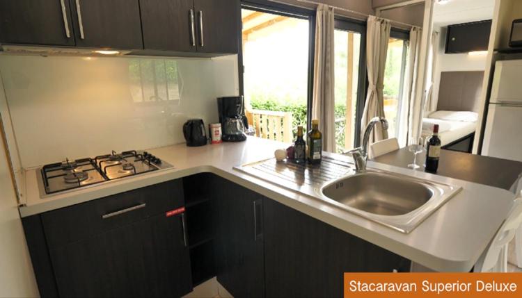 Kuchyň nebo kuchyňský kout v ubytování Casa Mobile - Spiaggia e Mare Holiday Park