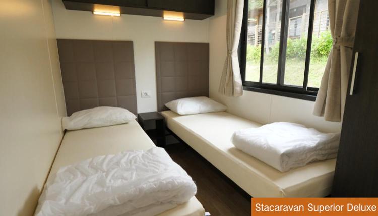 Postel nebo postele na pokoji v ubytování Casa Mobile - Spiaggia e Mare Holiday Park