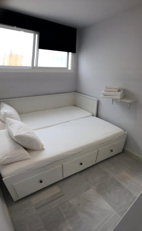 Postel nebo postele na pokoji v ubytování La Herradura 3 bedroom apartment