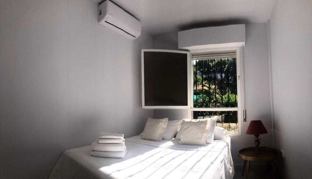 Postel nebo postele na pokoji v ubytování La Herradura 3 bedroom apartment