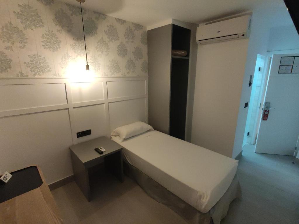 Postel nebo postele na pokoji v ubytování Hotel Cedran