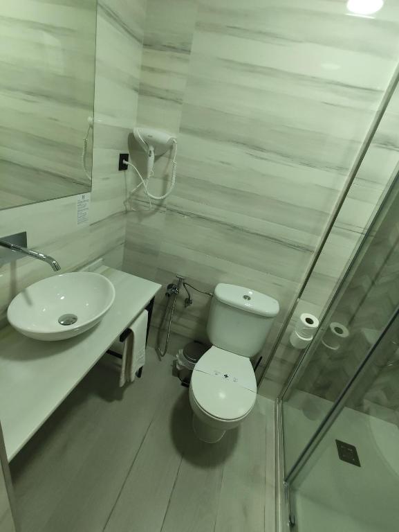 Koupelna v ubytování Hotel Cedran