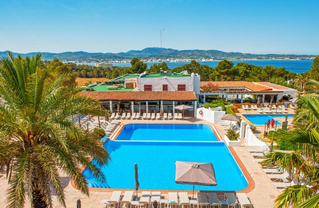 an aerial view of a resort with a swimming pool at Marble Stella Maris Ibiza in San Antonio