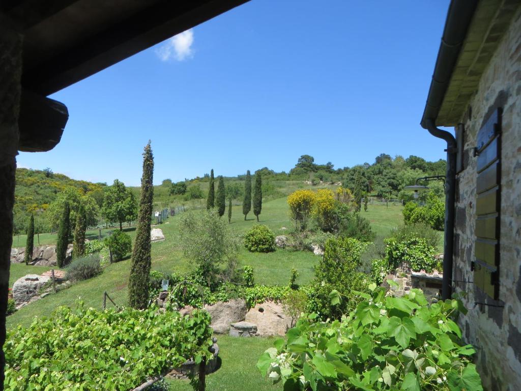 Zahrada ubytování Appartamento Melograno in casale con piscina - Val d'Orcia