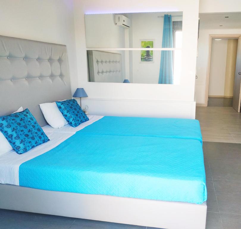 Posteľ alebo postele v izbe v ubytovaní Rethymno Hills Apartments