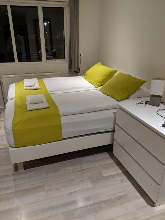 Postel nebo postele na pokoji v ubytování Apotek Guesthouse