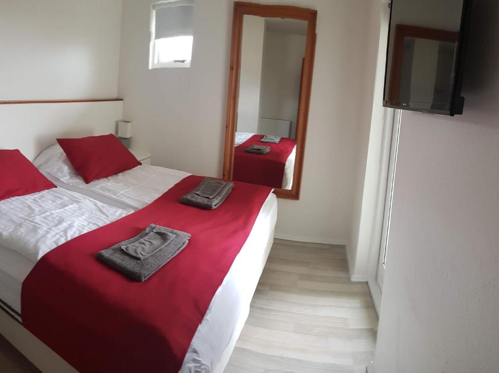 Postel nebo postele na pokoji v ubytování Apotek Guesthouse
