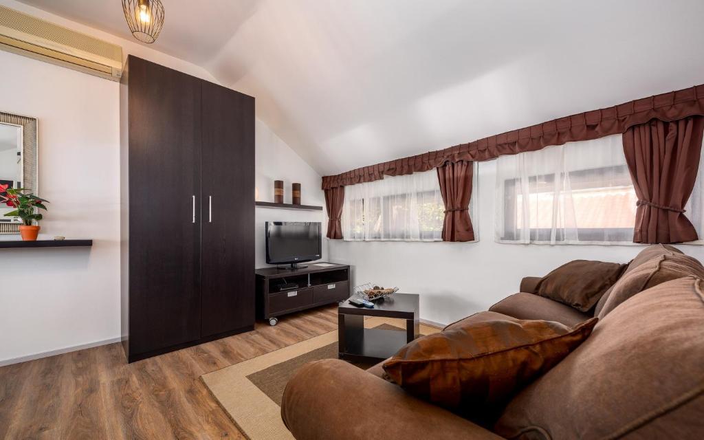 TV o dispositivi per l'intrattenimento presso Apartment Katoro