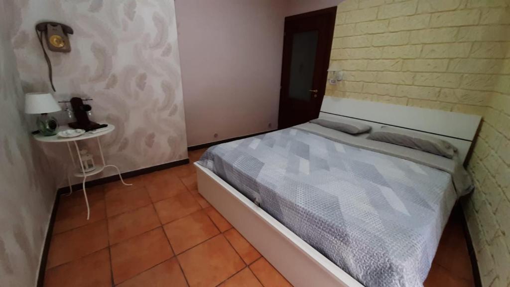 A bed or beds in a room at b&b ERCOLANO Scavi