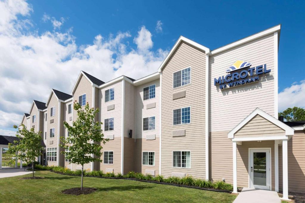 a rendering of the exterior of a hotel at Microtel Inn & Suites Windham in North Windham