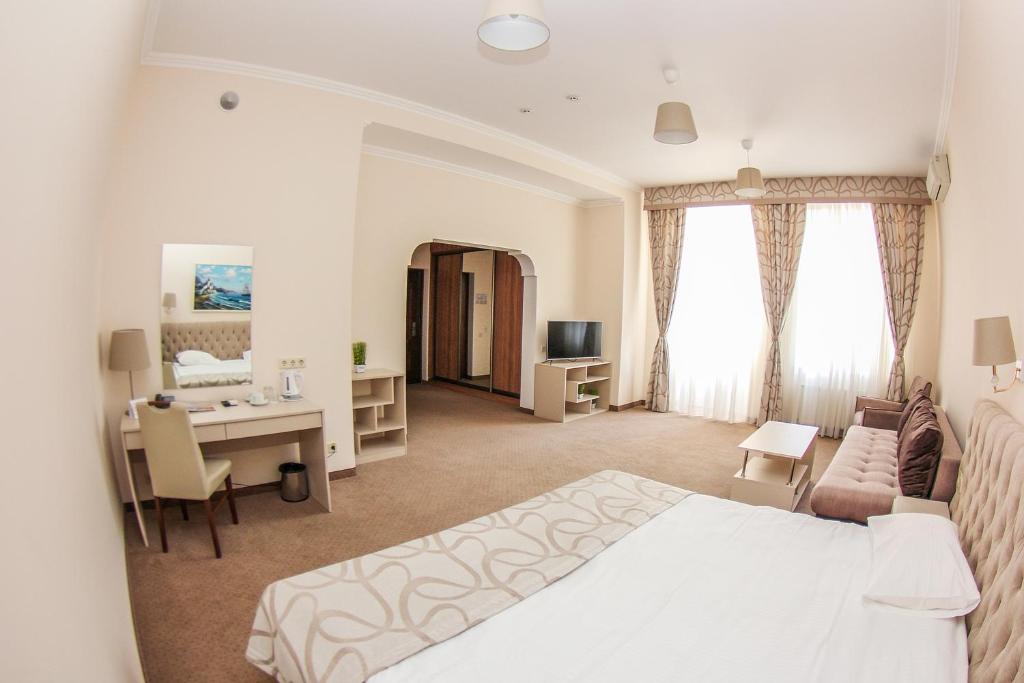 Postel nebo postele na pokoji v ubytování Hotel 52