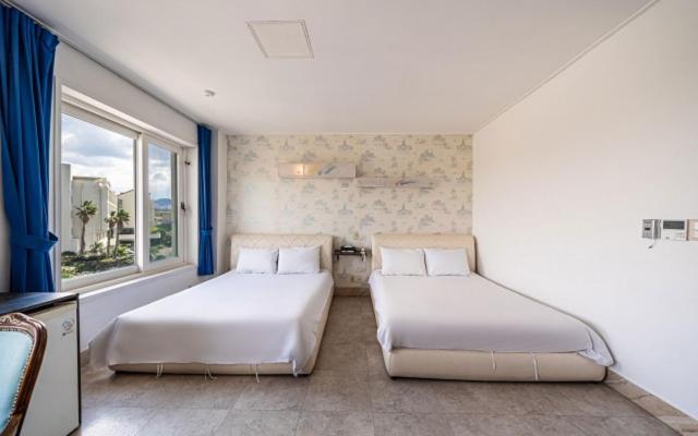 Postel nebo postele na pokoji v ubytování Hotel White House