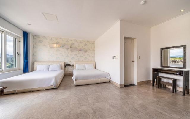 Postel nebo postele na pokoji v ubytování Hotel White House
