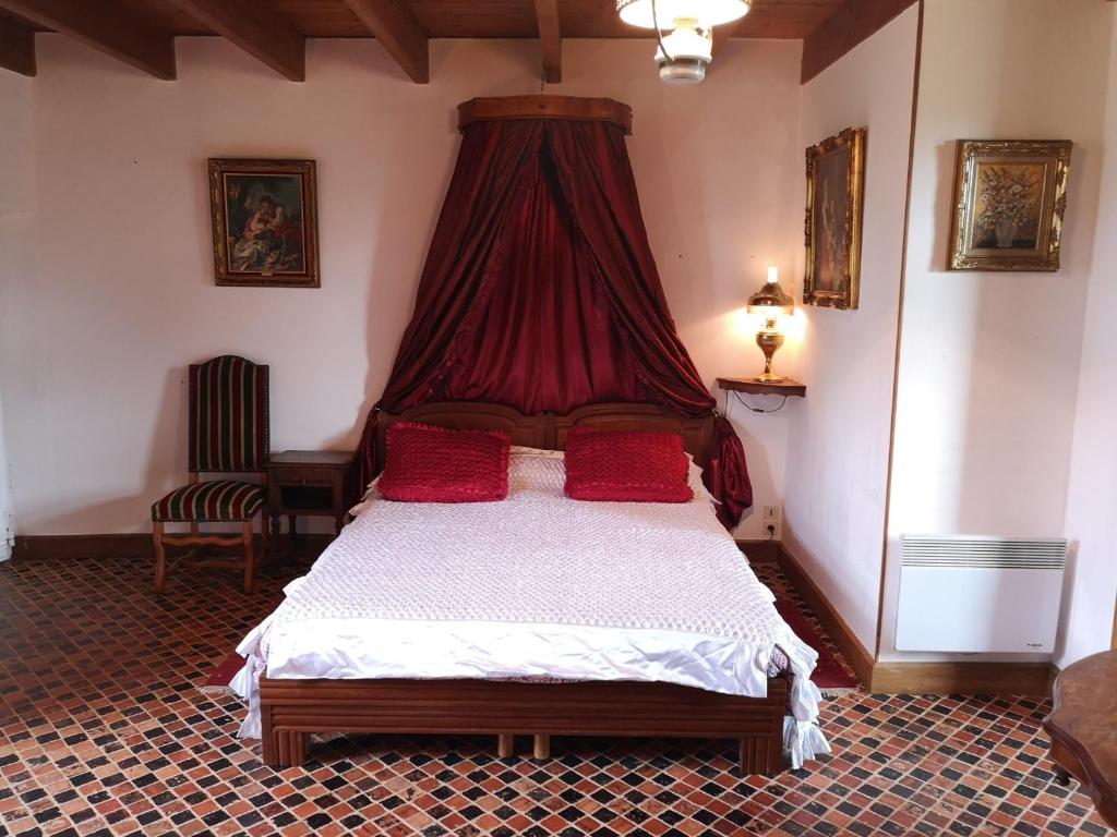 Postel nebo postele na pokoji v ubytování Manoir de la Foulerie