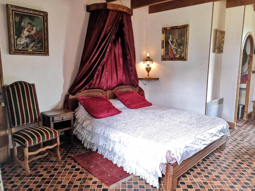 Postel nebo postele na pokoji v ubytování Manoir de la Foulerie