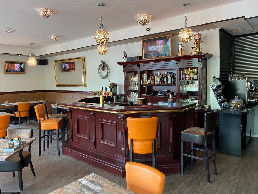 De lounge of bar bij City Hotel Restaurant Stadskanaal