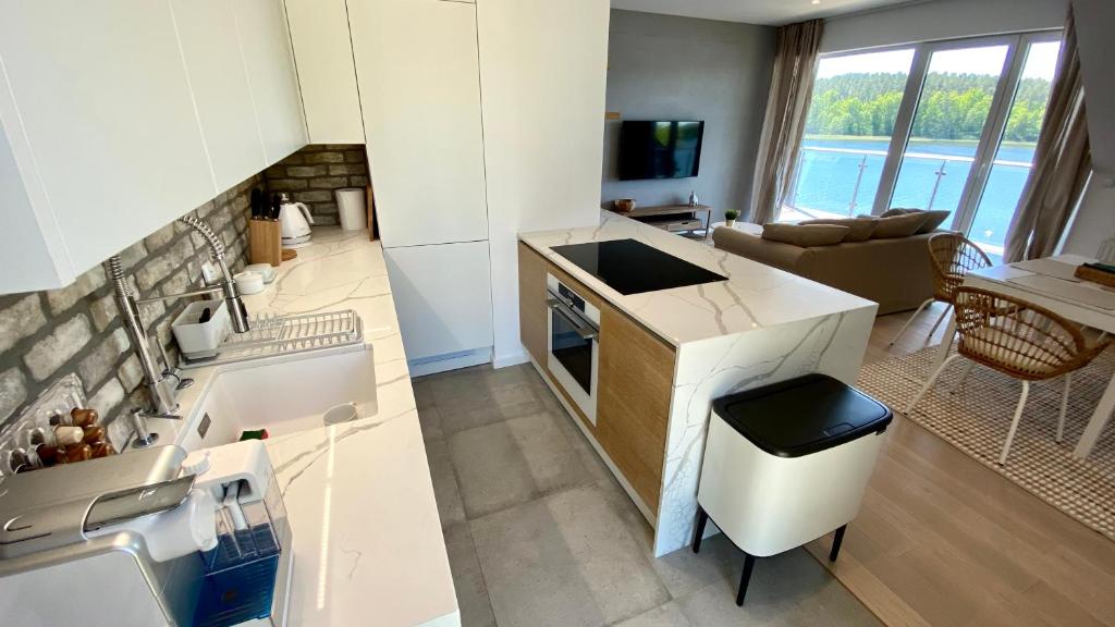 Kuchyňa alebo kuchynka v ubytovaní Apartament Blisko Natury