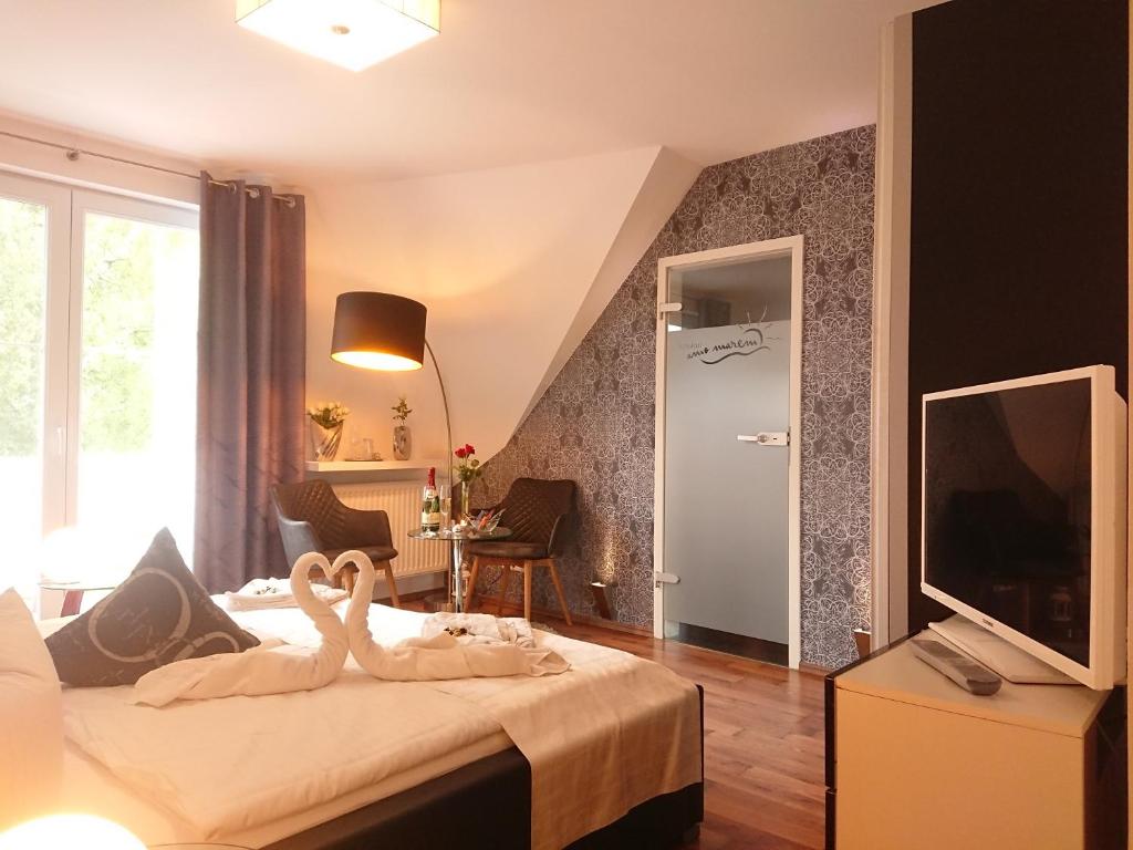 Postel nebo postele na pokoji v ubytování Pension Amo Marem