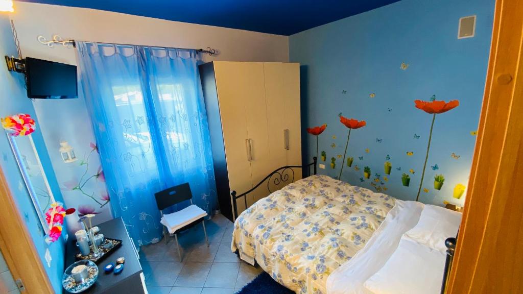 Postel nebo postele na pokoji v ubytování B&B Dolce Sogno