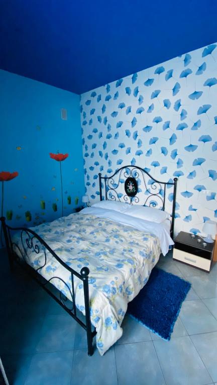 Postel nebo postele na pokoji v ubytování B&B Dolce Sogno
