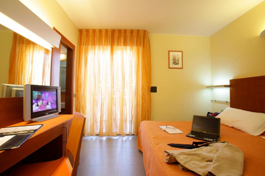 TV a/nebo společenská místnost v ubytování Hotel Coppe Jesolo