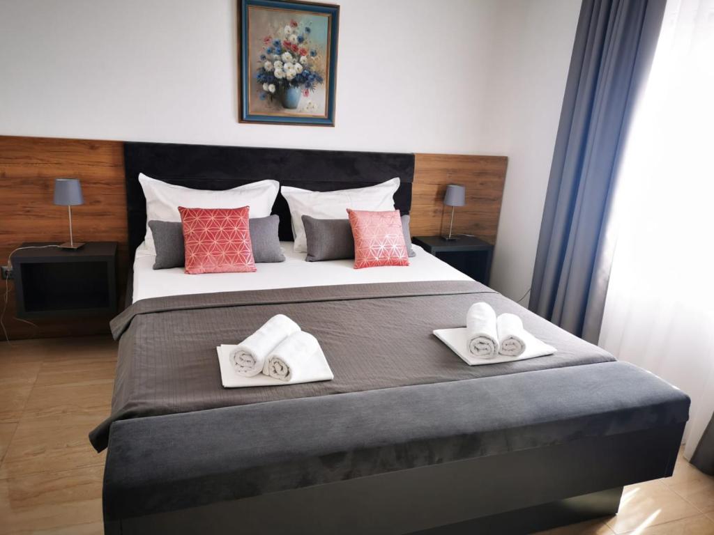 Postel nebo postele na pokoji v ubytování Apartment Marco