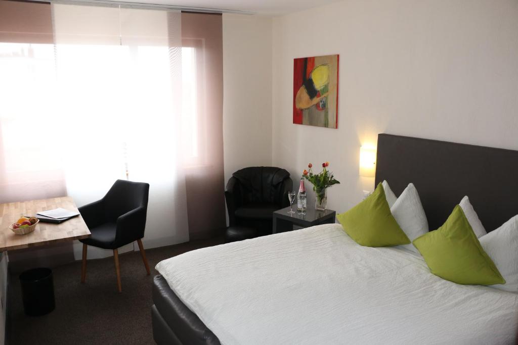 Postel nebo postele na pokoji v ubytování Hotel AM Schloss