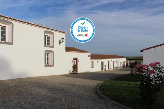 a building with a sign that says grown and safe at Monte Da Morena Agro-Turismo in Serpa