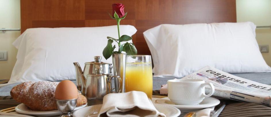 Postel nebo postele na pokoji v ubytování Hotel Coppe Jesolo